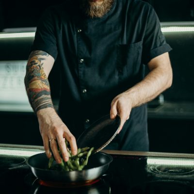 Man Cooking A Dish