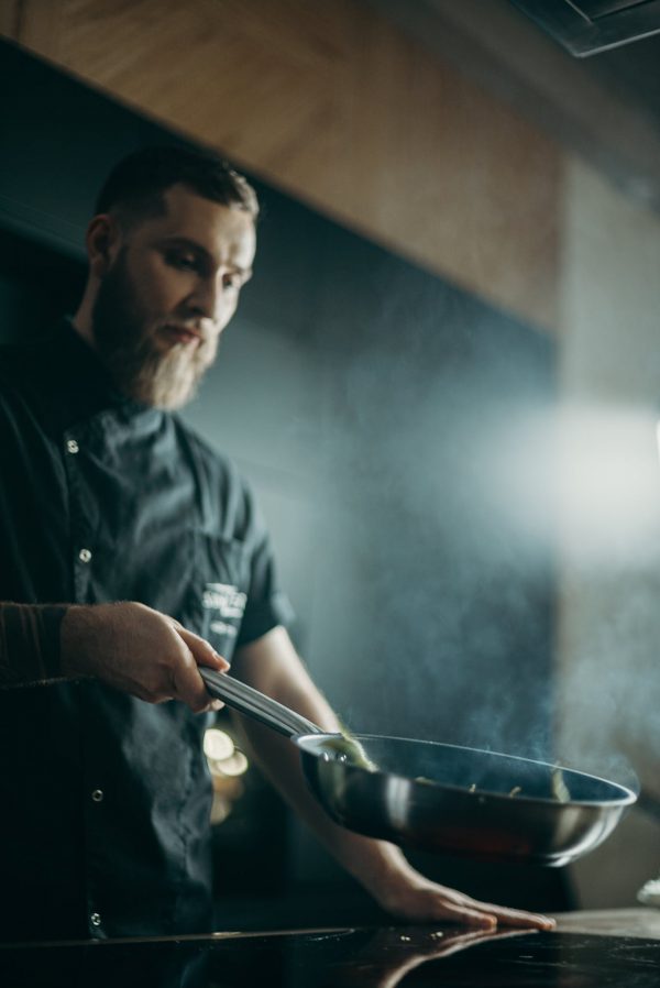 Man Holding Frying Pan